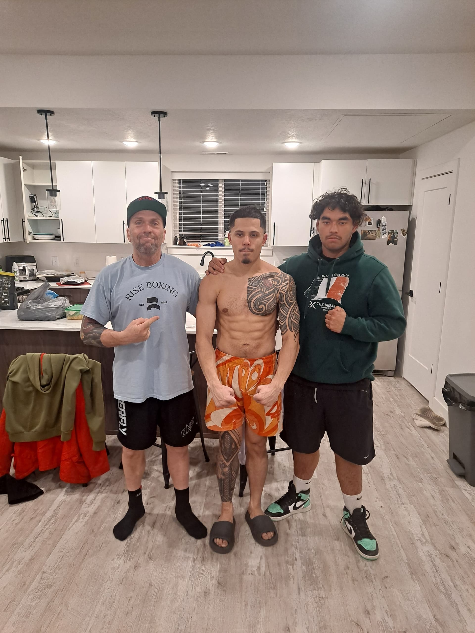 Brian with two athletes after a session
